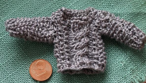 Strickpullover mit Zopf